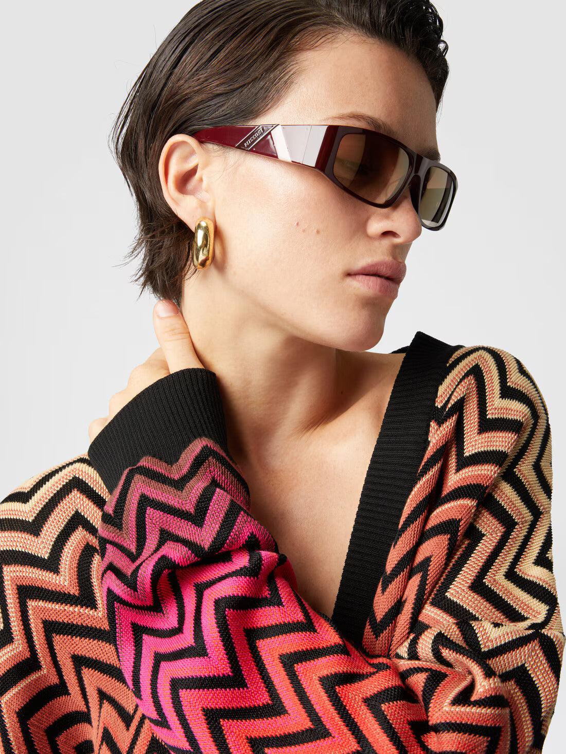 Maglia oversize motivo chevron dégradé con scollo a V